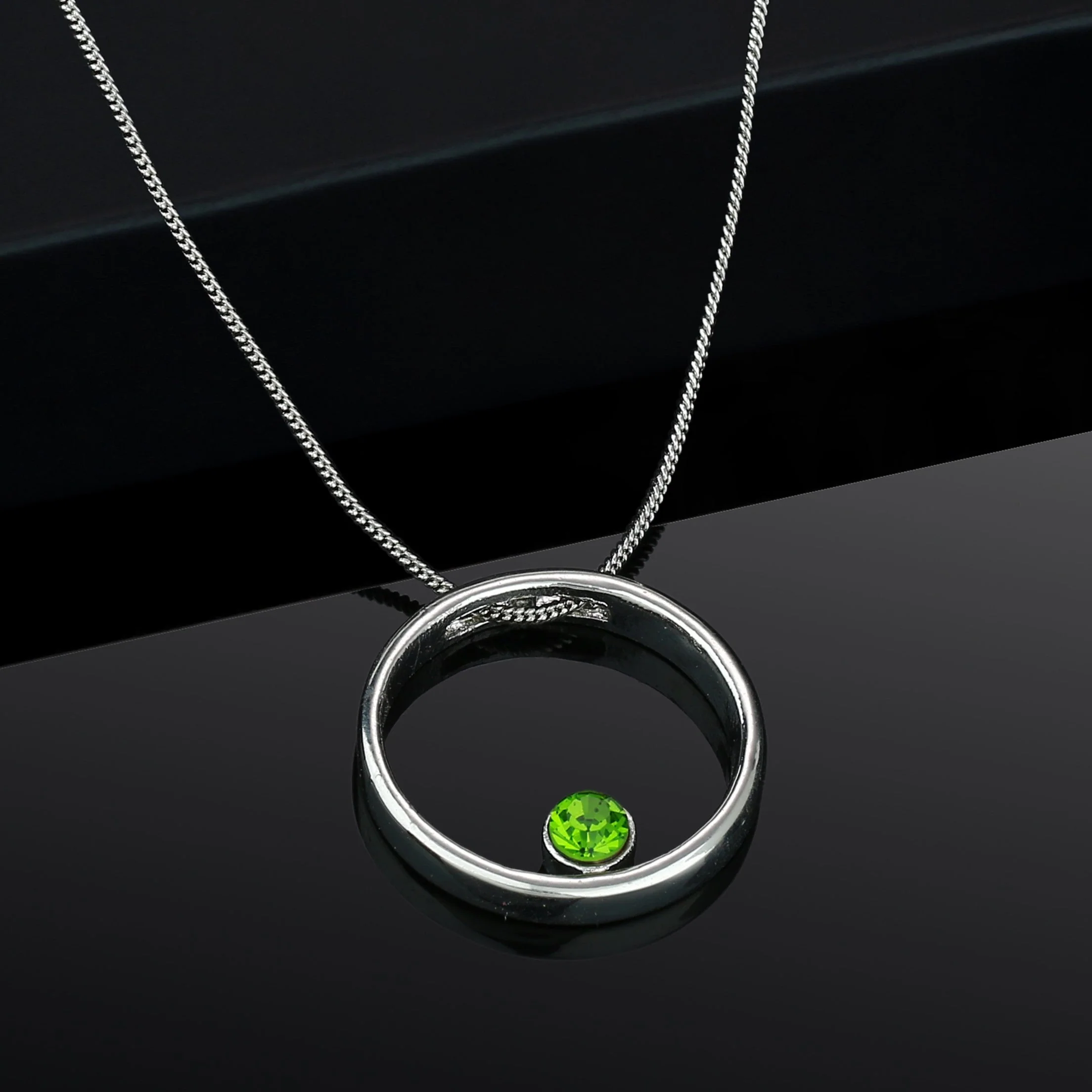 Estele Rhodium Plated Polaris Ring Green Stone Pendant For Women / Girls