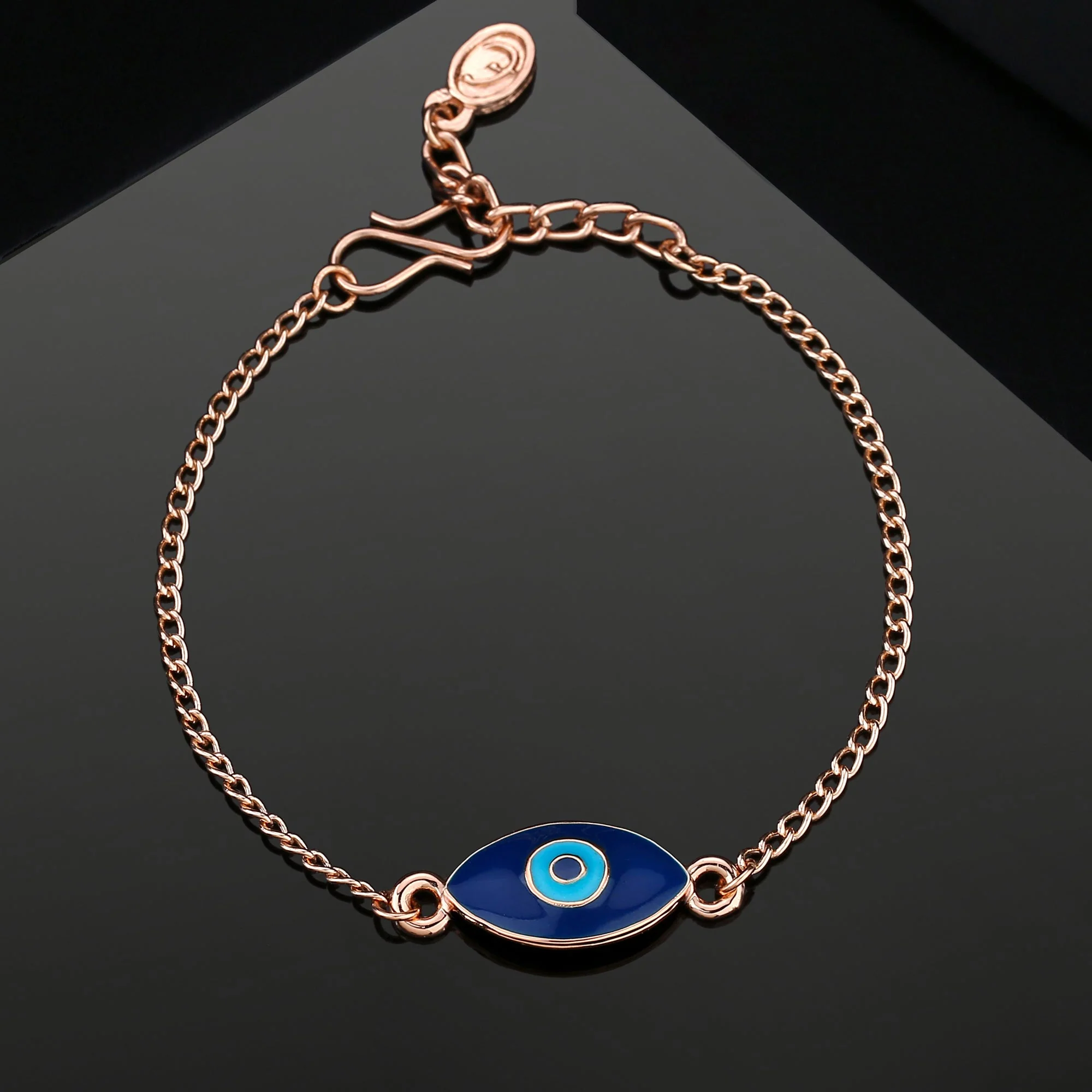 Estele Rose Gold Plated Auspicious Navy Blue Enamel Evil Eye Rakhi Charm Bracelet - Image 10