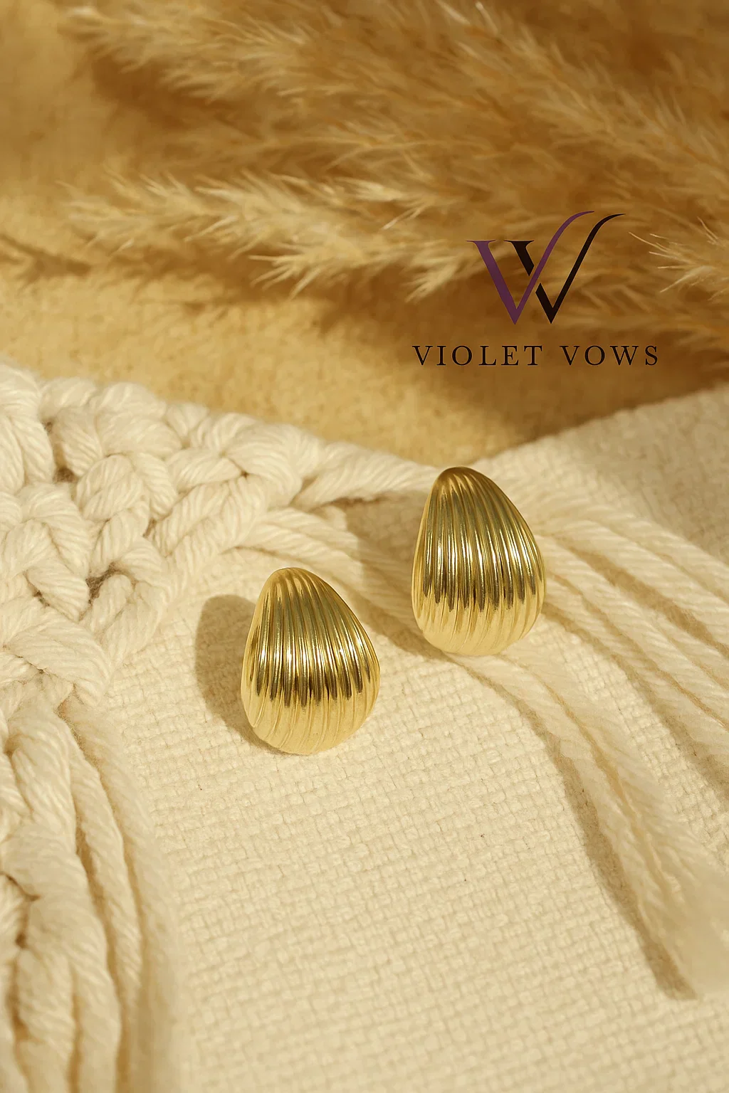 Gold Teardrop Stud Earrings - Image 2