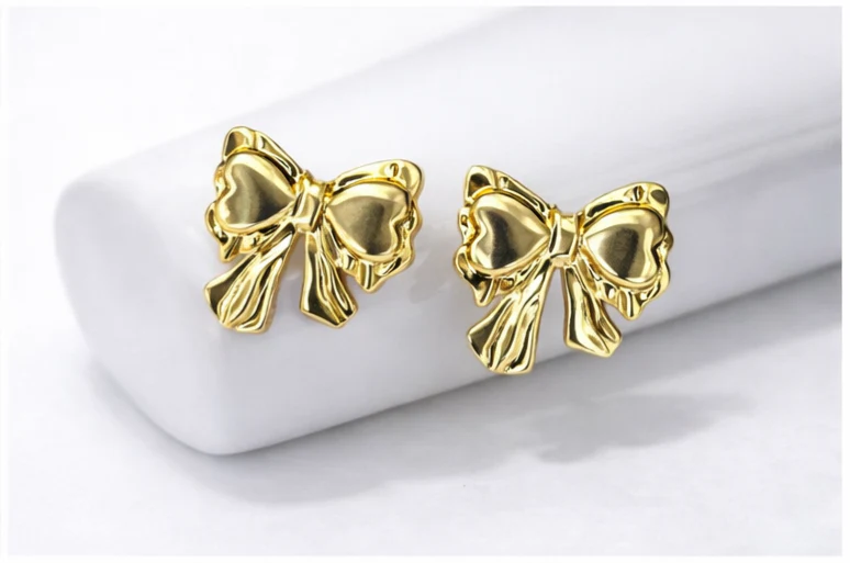 Golden Bow Stud Earrings - Image 2