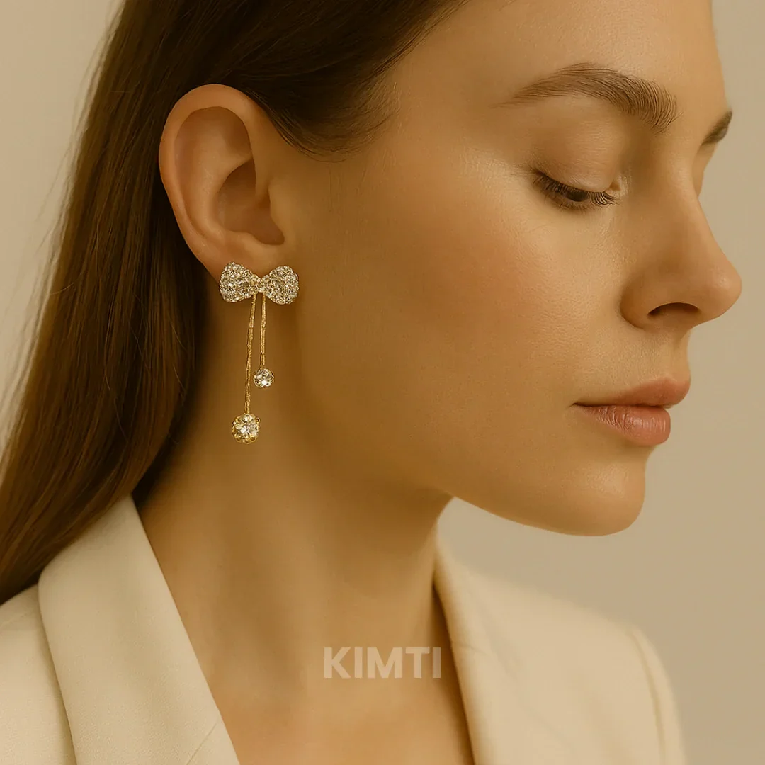 Luminous Silver Bow Drop Earring - Image 2