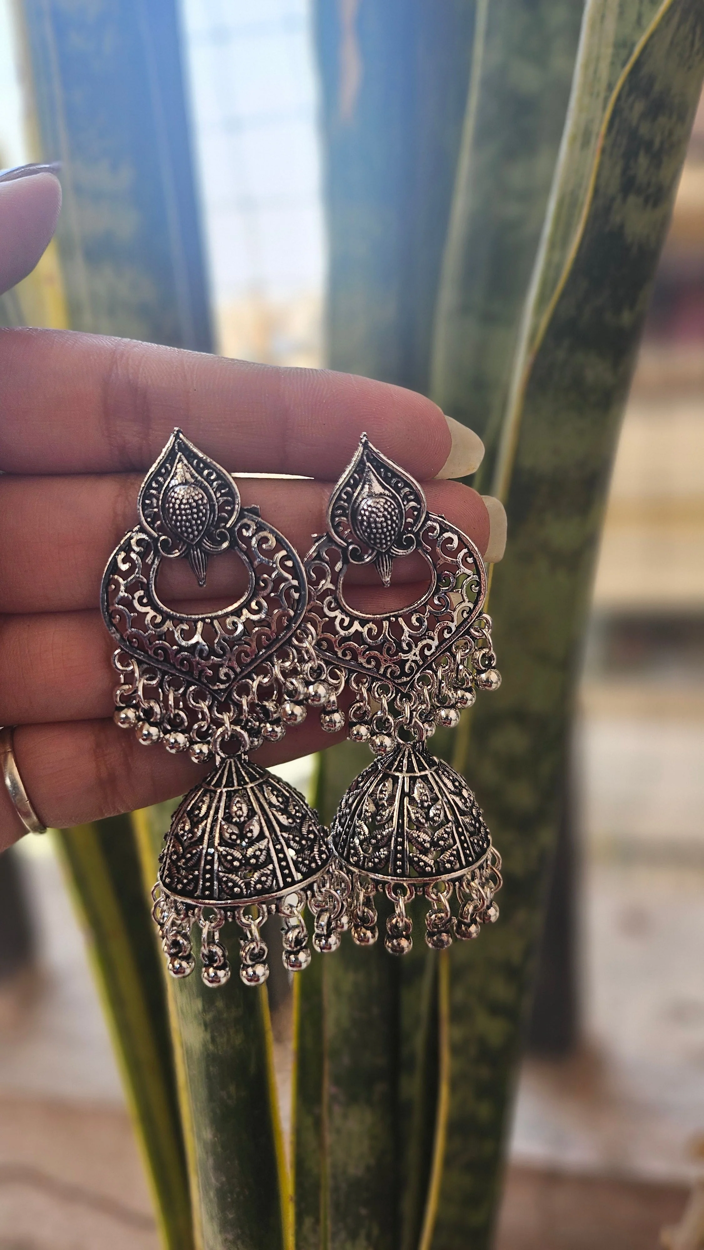 Oxidized Silver Peacock Jhumka Earrings - Image 3