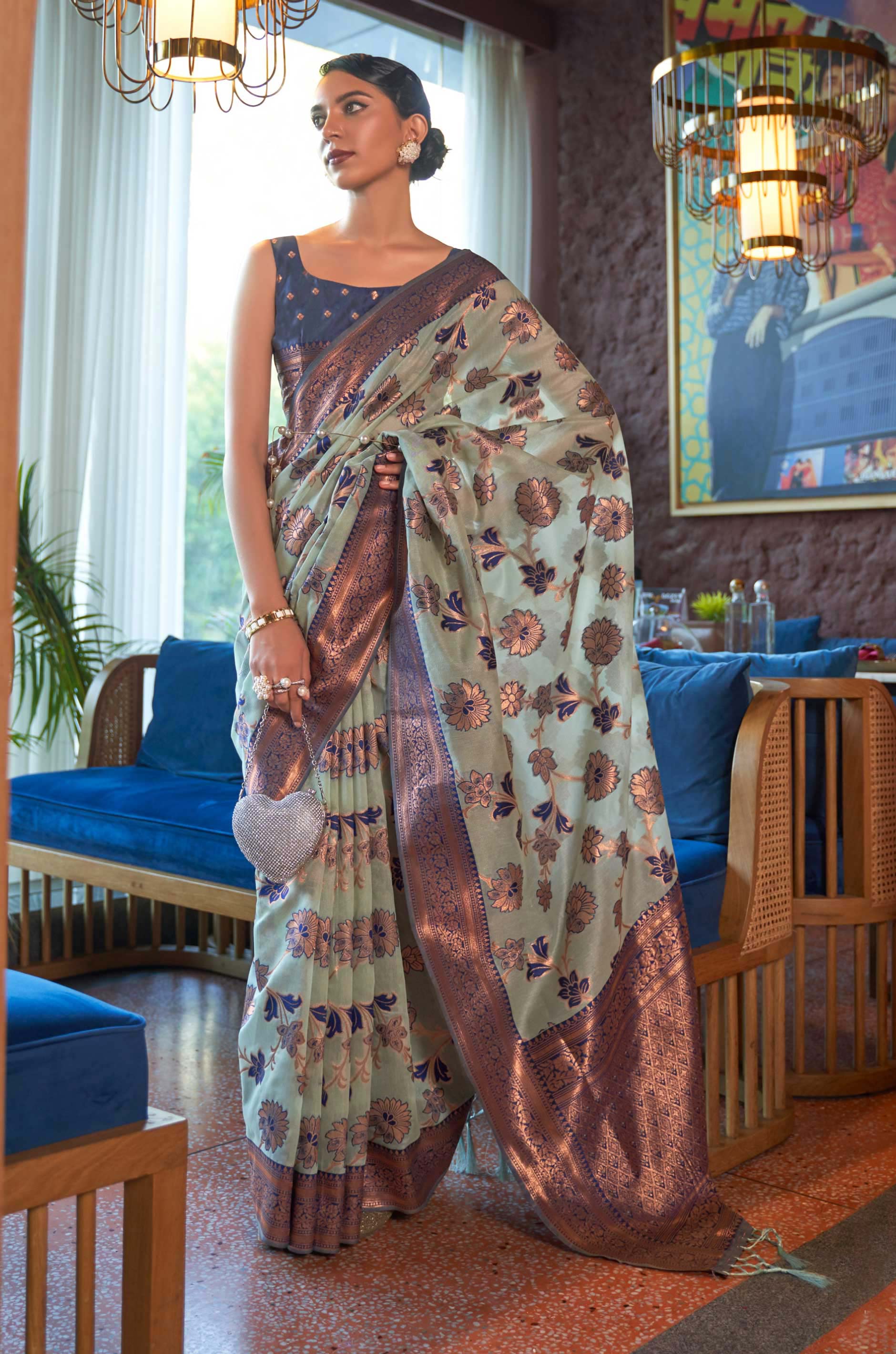 Pastel Green Floral Woven Organza Silk Saree