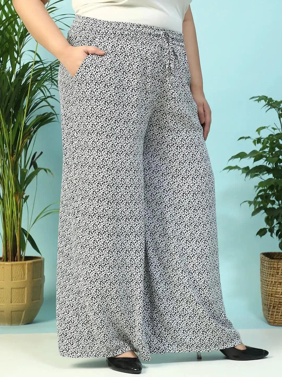 Toned White Animal Print Flared Elasticated Waist With Up Detail Plus Size Women Pant - Image 4