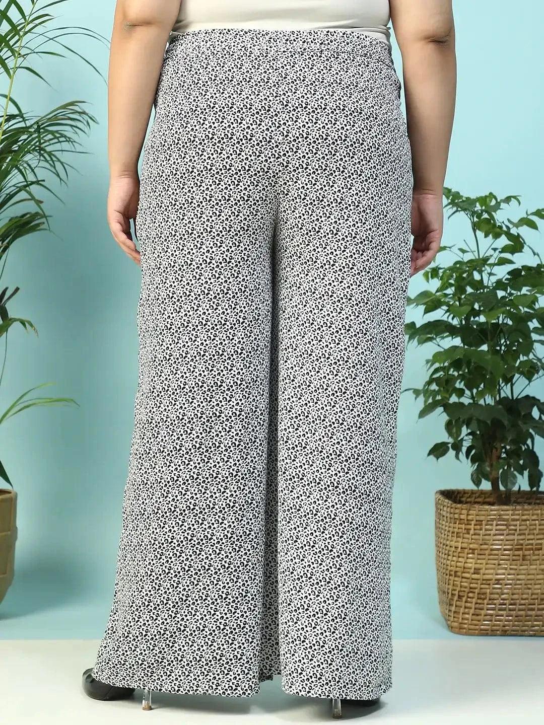 Toned White Animal Print Flared Elasticated Waist With Up Detail Plus Size Women Pant - Image 5