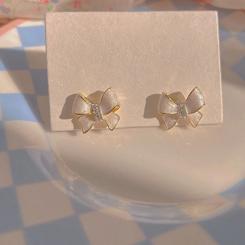 White Bow Stud Earrings - Image 5