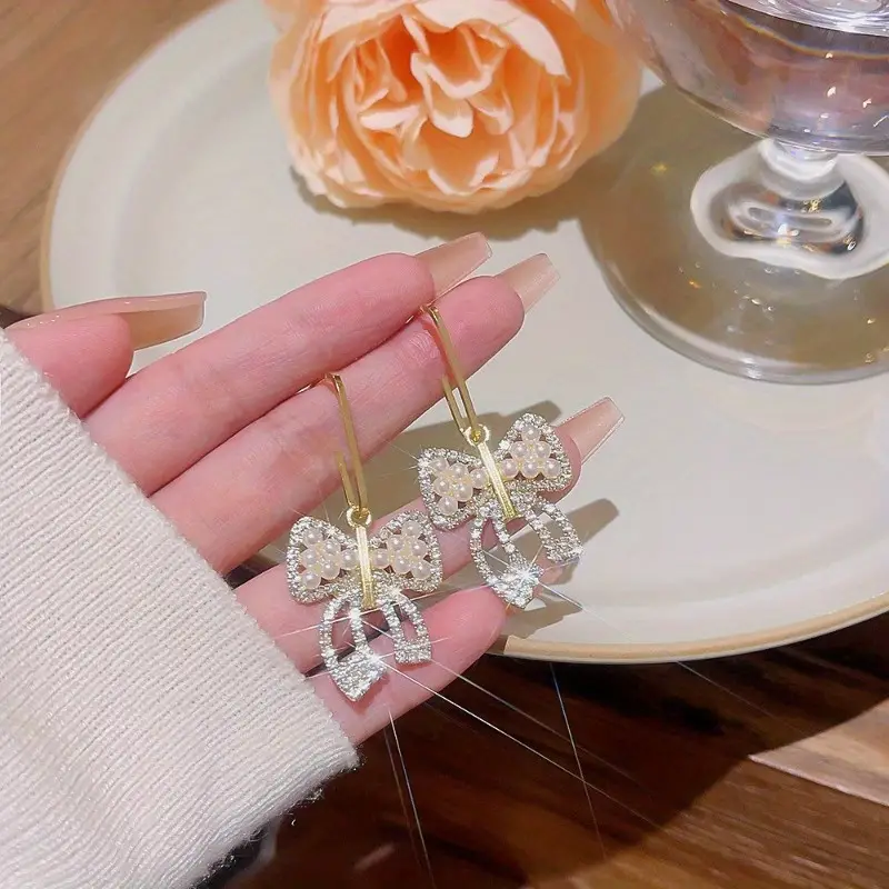 White Pearl Bow Drop Earring - Image 2